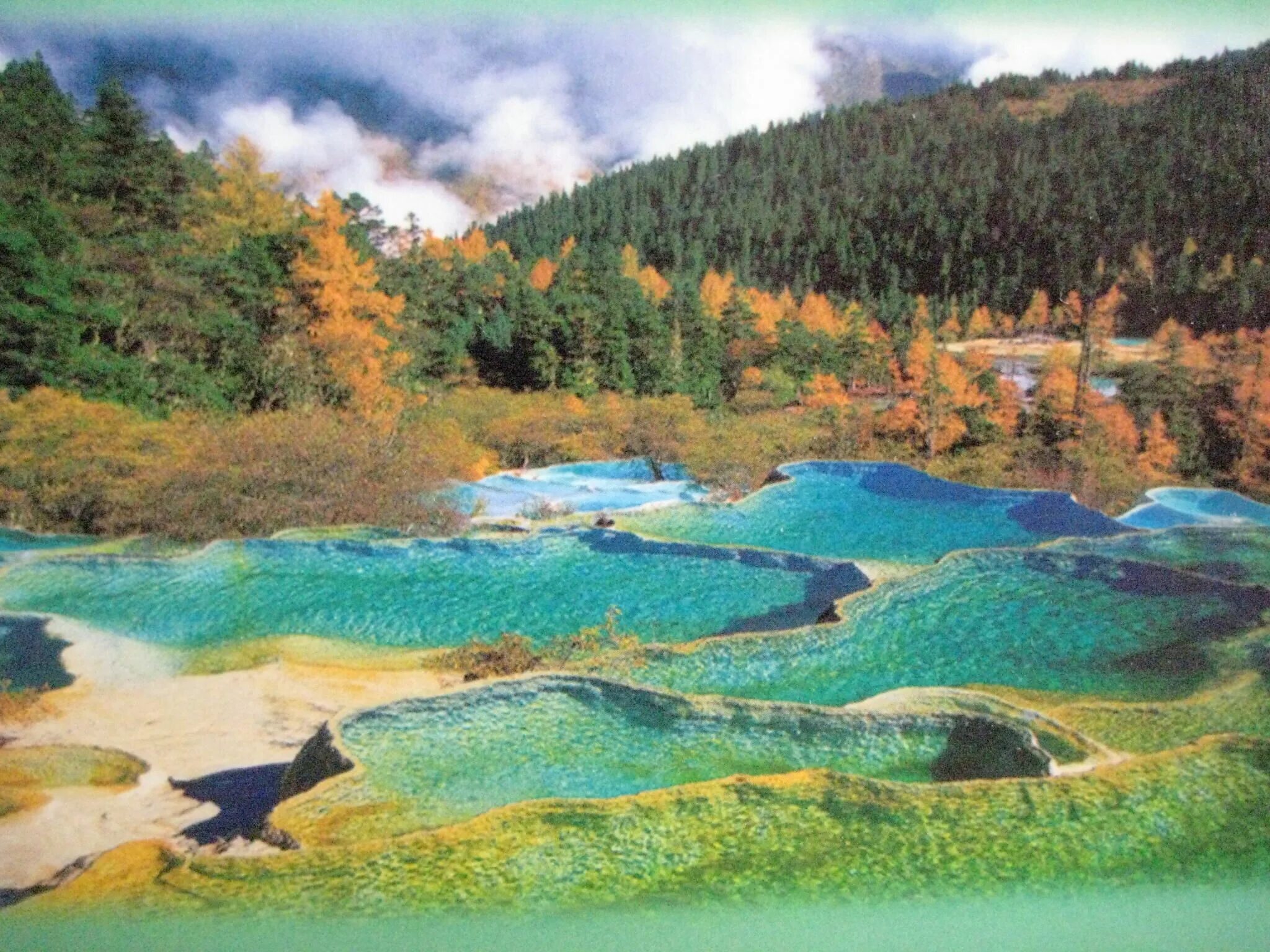 Национальный парк хуанлун. Национальный парк хуанлун, сычуань. Долина хуанлун китай. Хуанлун дракон. Заповедник хуанлун (желтый дракон).