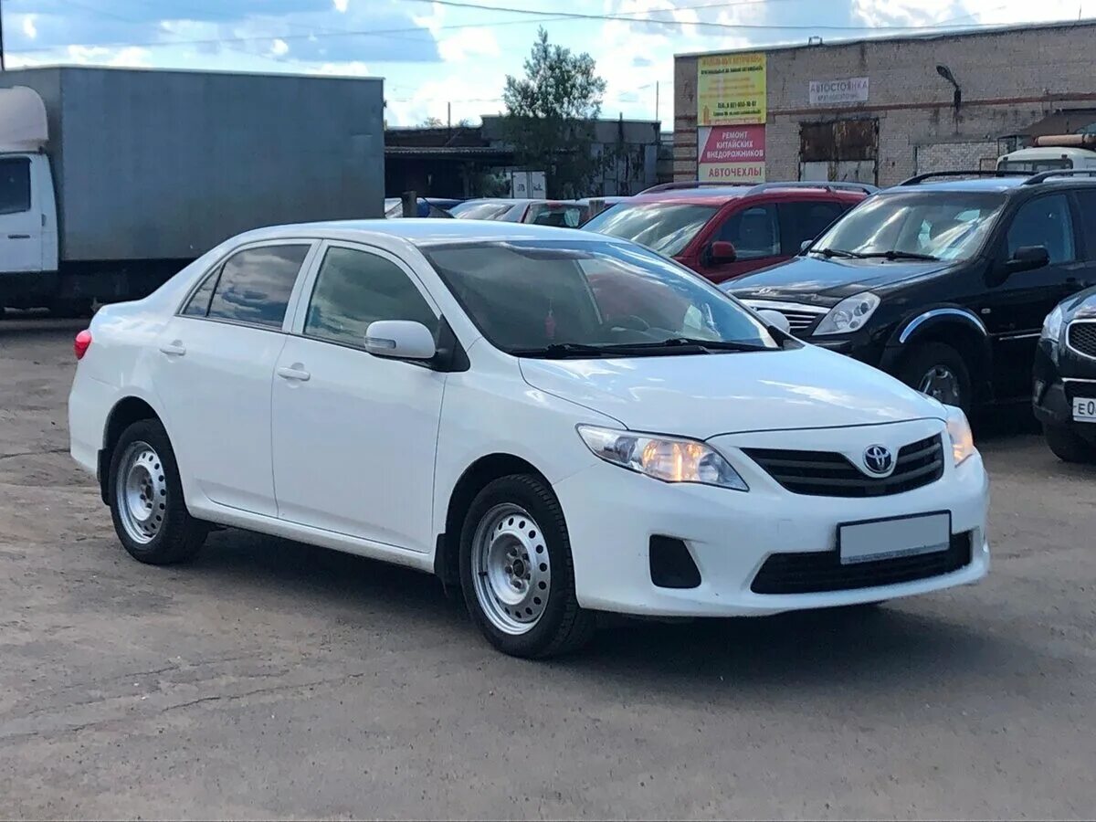 Тойота Королла 12 года. Тойота Королла 2013 Рестайлинг. Toyota Corolla (e150) 2013 года белый. Тойота Королла 150 2013 года.