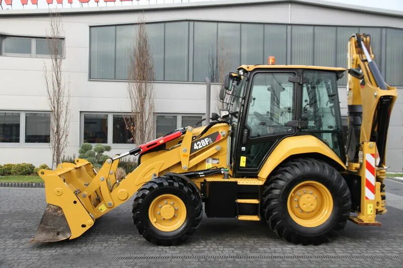 Cat 428. Экскаватор погрузчик катерпиллер 428f. экскаватор-погрузчик caterpillar 428. экскаватор-погрузчик caterpillar 428f2. катерпиллер экскаватор погрузчик 428.