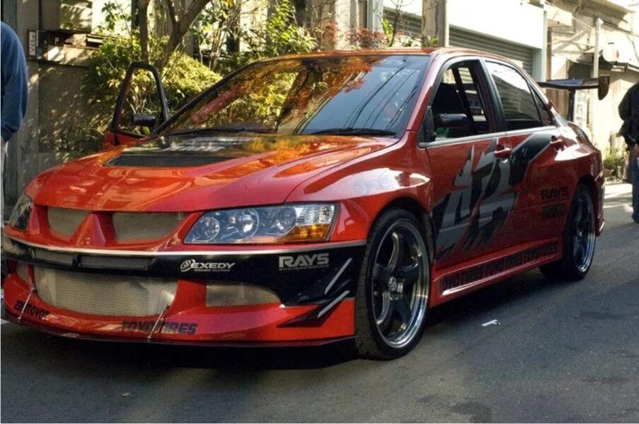 Форсаж токийский дрифт машины. Митсубиси Лансер Эволюшн Форсаж 3. Mitsubishi Lancer Evolution Форсаж 3. Mitsubishi Lancer EVO VII Форсаж 2. Мицубиси эвик 9.