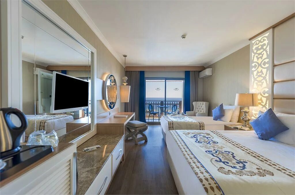 Отели турции quattro beach. Отель в турции кватро бич. quattro beach resort spa 5. отель quattro beach resort spa 5 турция. отель кватро бич алания турция.