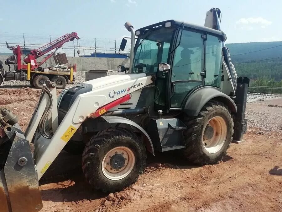 Экскаватор погрузчик 825. Экскаватор-погрузчик TLB 825-RM (Терекс). RM-Terex-TLB 825-RM. Терекс погрузчик экскаватор 825 АКБ. Терех 825 2018 connection points.