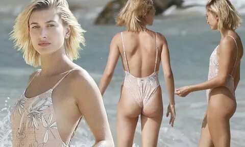 Hailey Baldwin wows in pink swimsuit in Hawaii Daily Mail Online.