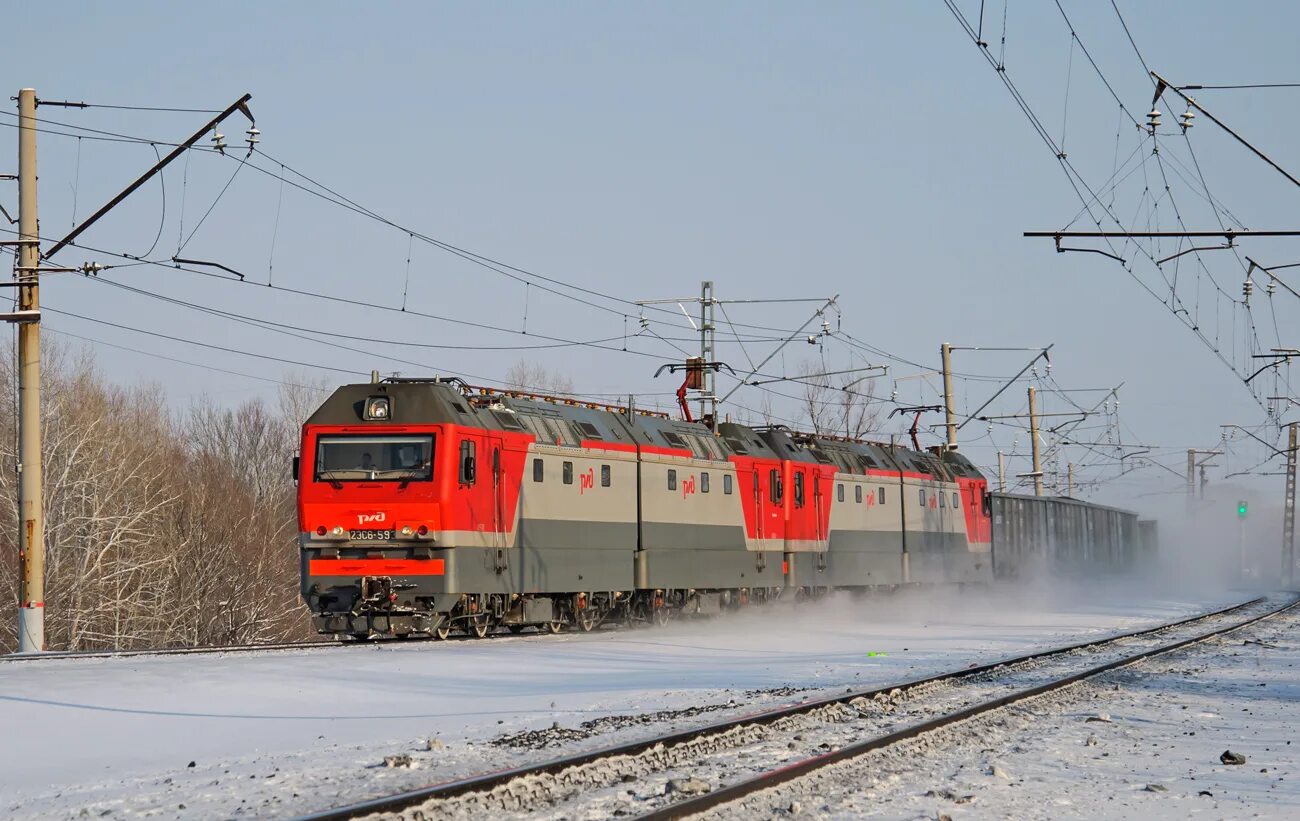 Укажите расчетную скорость электровозов 2эс6 3эс6 4эс6. Электровоз синара 2эс6. электровоз 2эс6 ржд. локомотив 2эс6. электровоз синара 2эс6 кабина.
