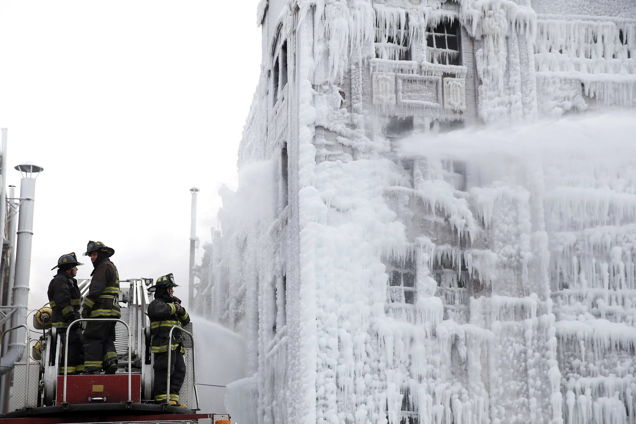 Building on Fire. Fire into Ice reflections. "Ice Chicago field Office Director Henry Lucero"+"United States". "Ice Chicago field Office Director Henry Lucero".