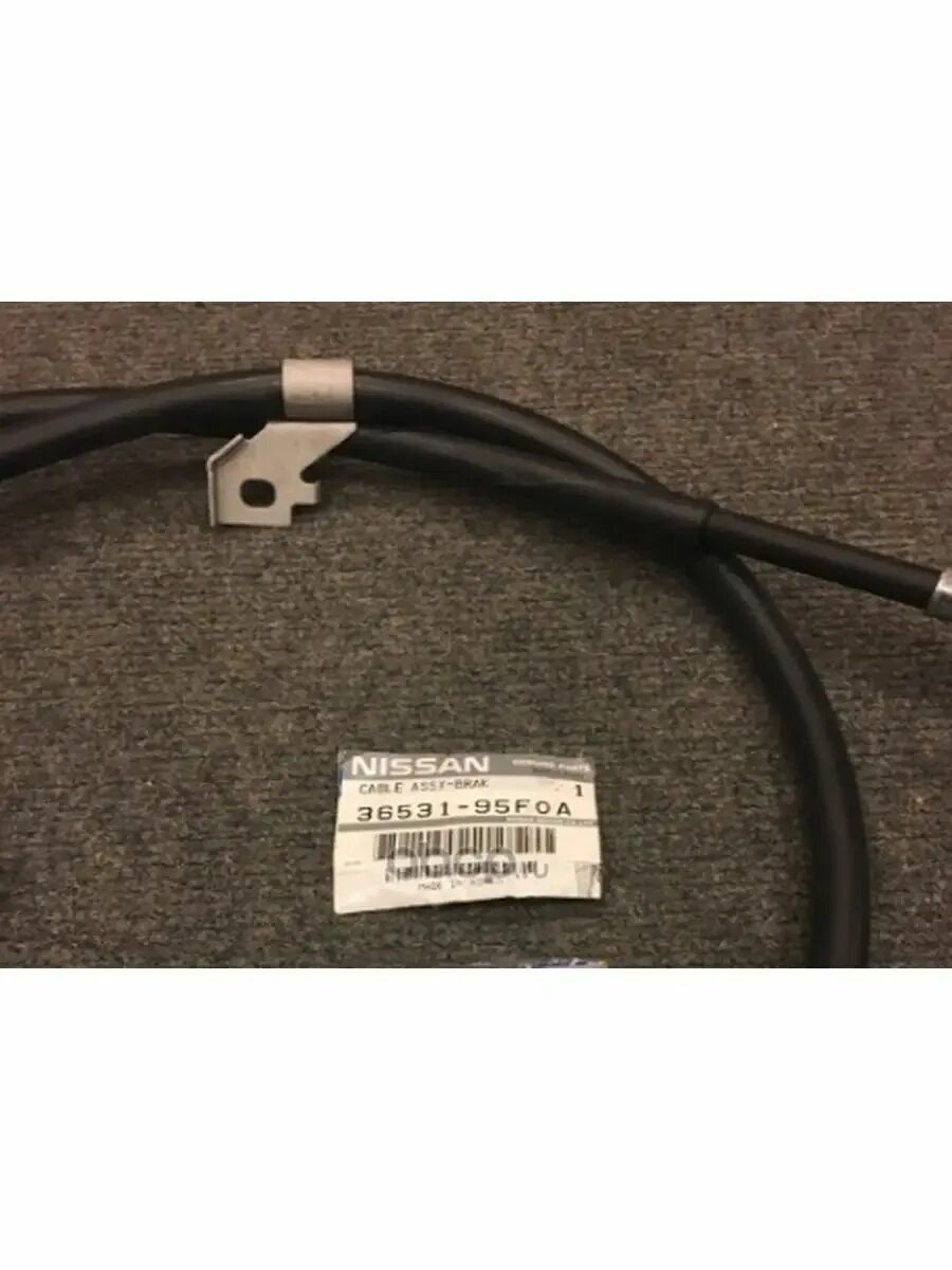 8465095f0a nissan трос открывания. Ниссан альмера классик трос стояночный. Трос ручника ниссан кабстар. Тросик ручного тормоза ниссан альмера классик. Тросик на ниссан альмера классик.