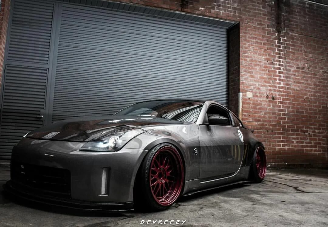 Nissan 370z stance. Nissan 370z Nismo JDM. Nissan z 2023 стенс. Ниссан 350з на стенсе. Z import