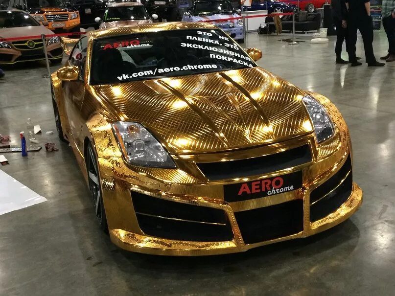 Z gold. Nissan 350z золотой. Золотой Ниссан Машинаторы. Nissan 350z махинаторы. Махинаторы Ниссан 350z.