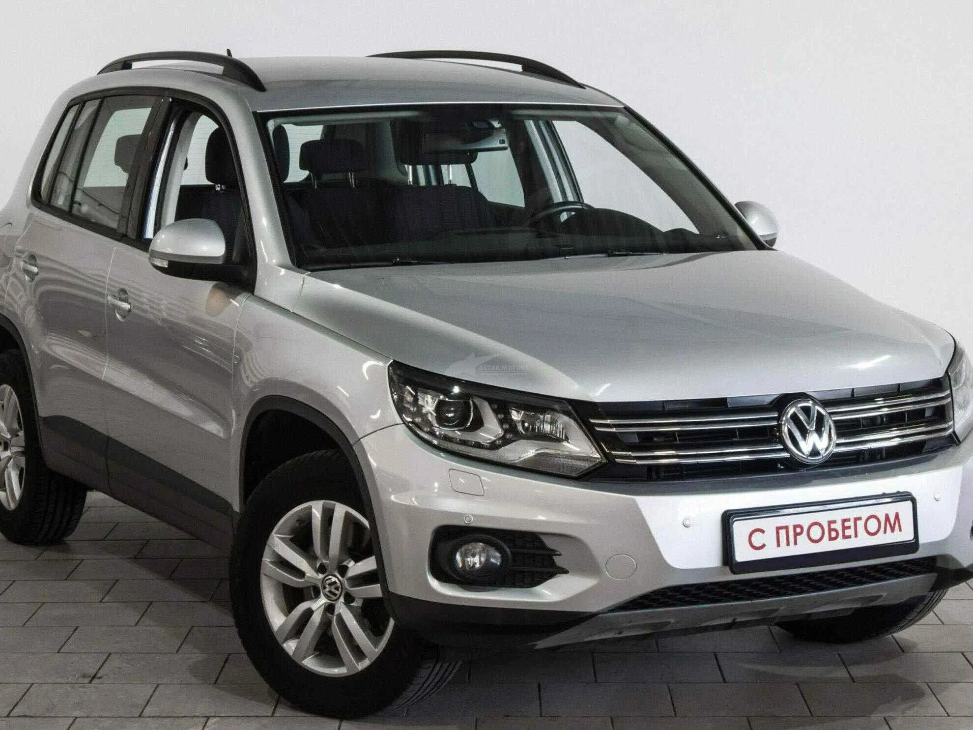 Volkswagen tiguan 2014. Фольксваген Тигуан 2014г. Tiguan Рестайлинг 2014. Фольцвпген Тигуан 2014. Volkswagen Tiguan II белый с пробегом.