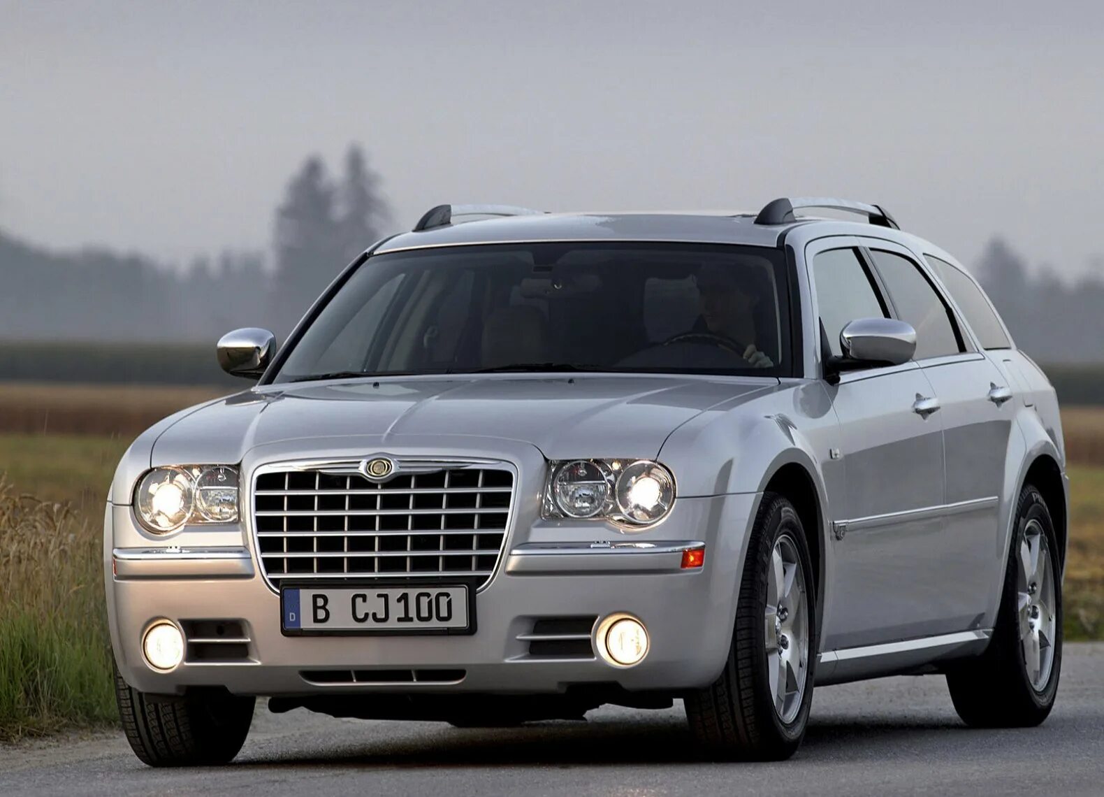 Крайслер 300c универсал. Chrysler 300c Touring 2005. Chrysler 300 универсал. Chrysler 300 Touring.