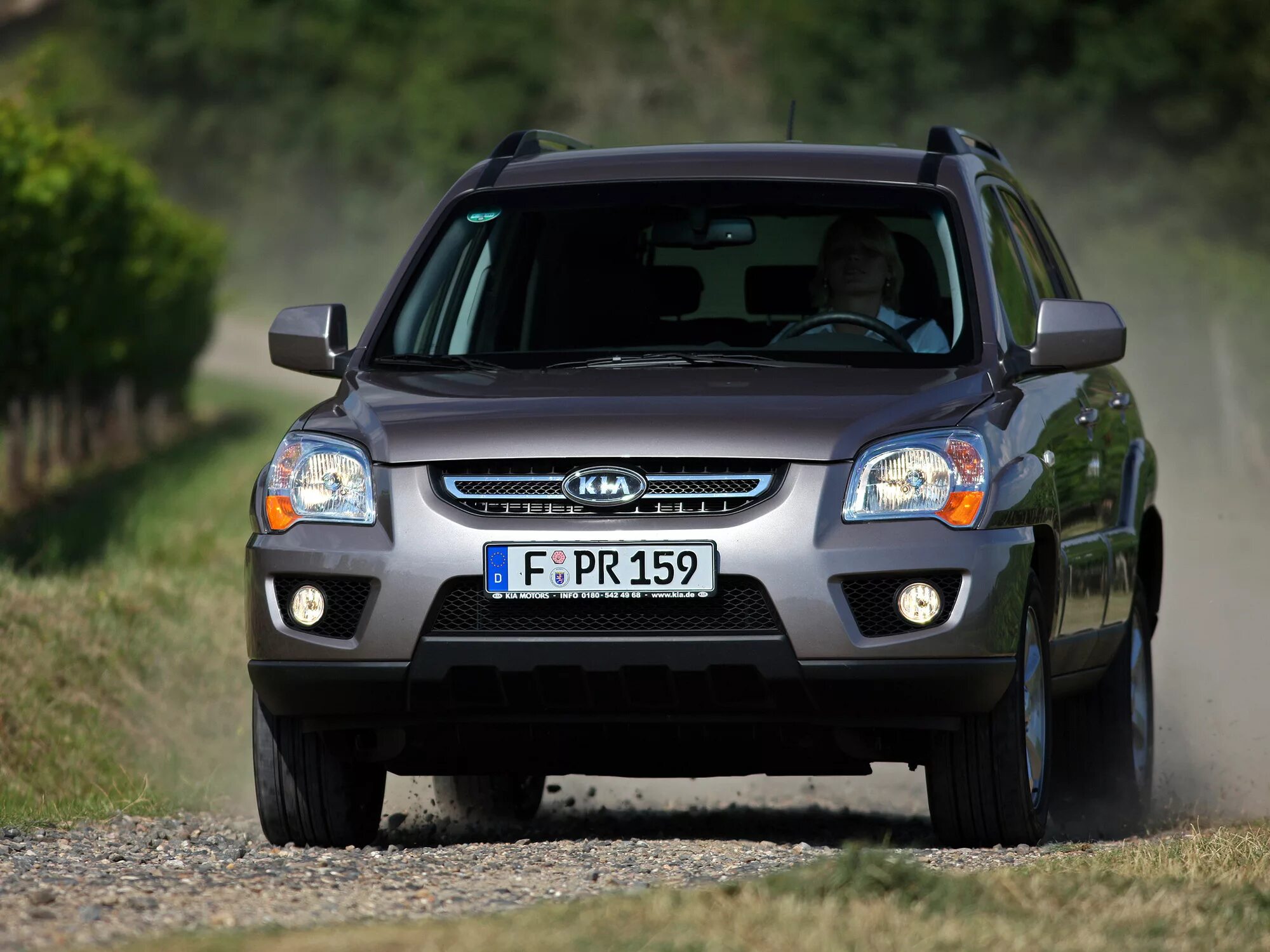 Kia Sportage 2. Киа Спортаж 2 поколения. Kia Sportage 2008-2010. Kia Sportage 2009.