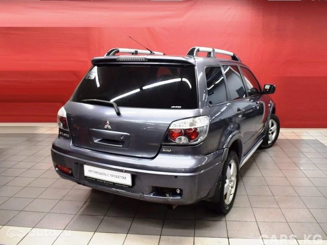 Mitsubishi outlander первое поколение. Mitsubishi Outlander 1. Митсубиси Аутлендер 1 поколения. Mitsubishi Outlander 2006 2.4. Mitsubishi Outlander 2 2006.