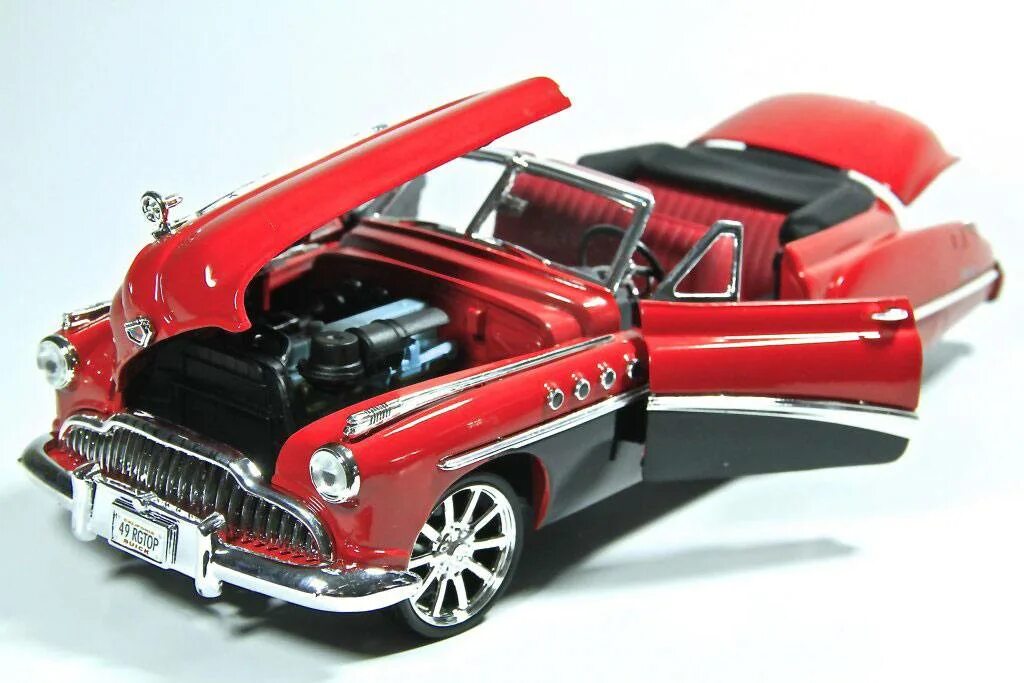 Автомобили 1 18 купить. Buick Roadmaster 1 18. Motormax Buick 1:18. Buick Roadmaster 1949 1 18. Buick Roadmaster модель 1/24.