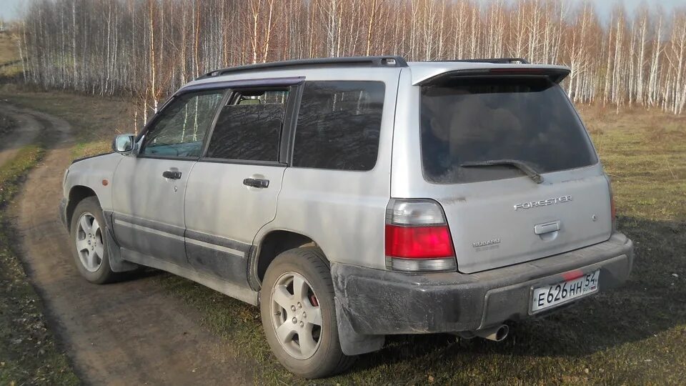 Дром ру субару. Subaru Forester серая 2000. Серо-серый Forester SF. Субару Форестер серо зеленый. Темно серый Форестер SF.