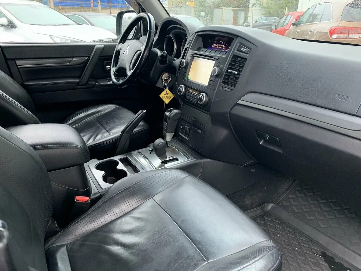 салон паджеро спорт 2. Pajero sport 2008 салон. Mitsubishi pajero sport 2015. Pajero sport 2 салон. митсубиси паджеро спорт 2 салон.