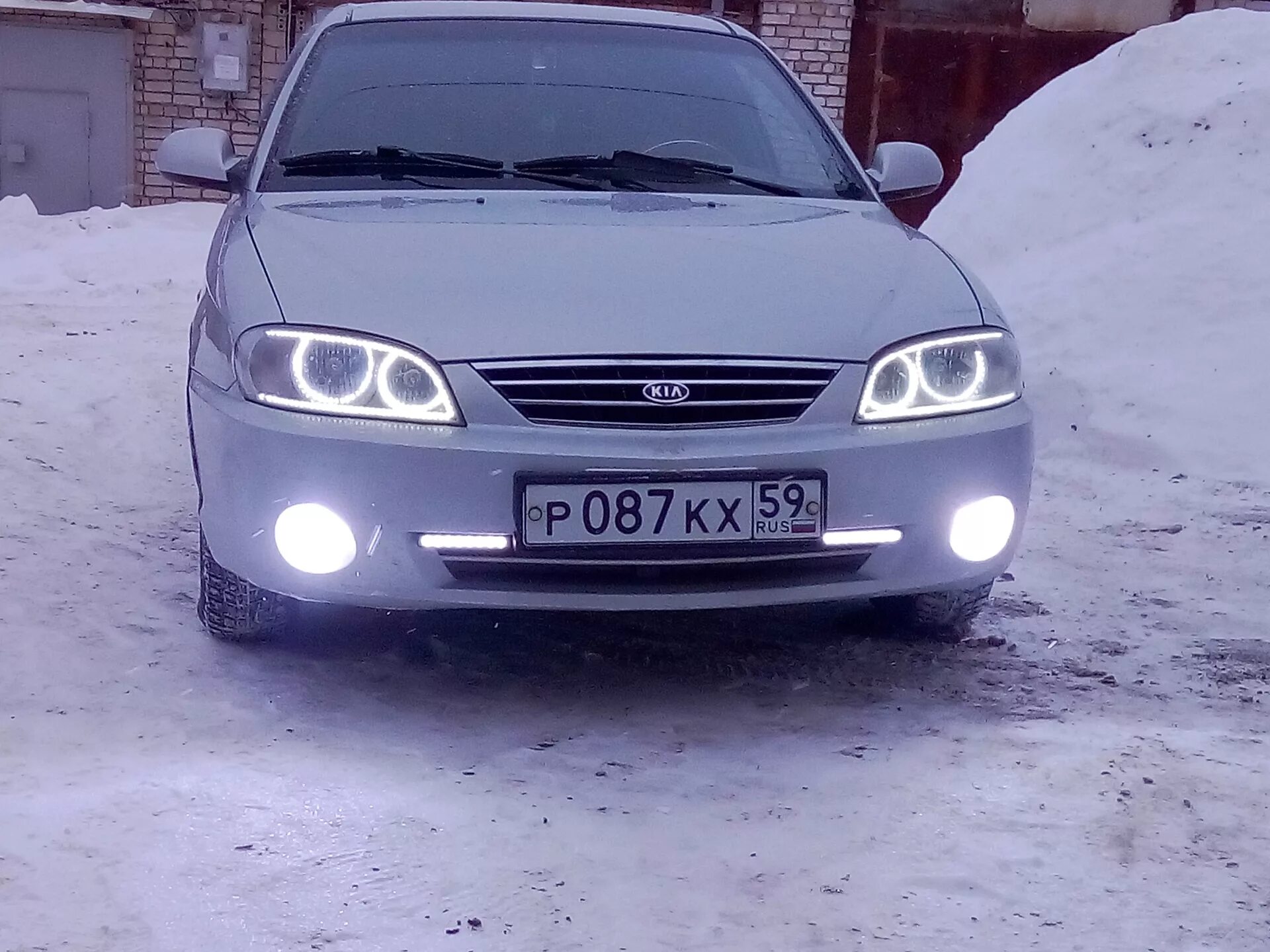 Противотуманные фары киа спектра. Kia Spectra 2006 ходовые огни. ПТФ ангельские глазки Kia Spectra. ПТФ ВАЗ 2170 на Киа шума 2.