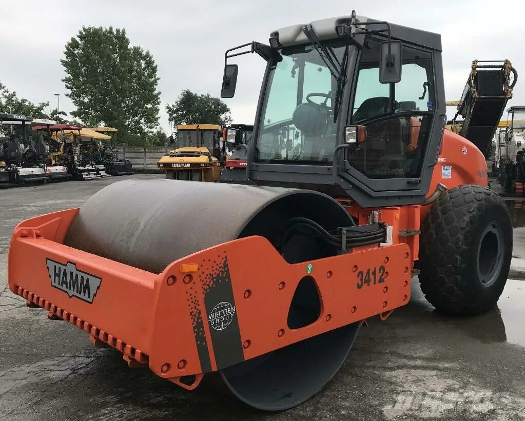 Грунтовый каток амман. Каток бомаг 213. Xcmg xs335. Каток грунтовый намм 3412. Bomag bw 154 ap-4.
