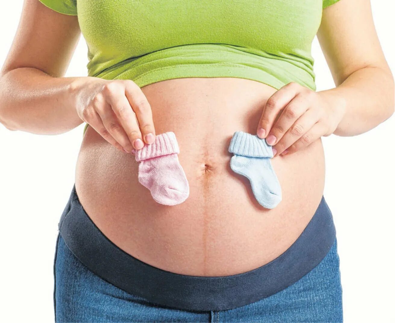 Вторая беременность мальчиком. Животики беременных мальчиками. Беременность мальчиком и девочкой. Пол ребёнка по полоске на животе. Многоплодная беременность.