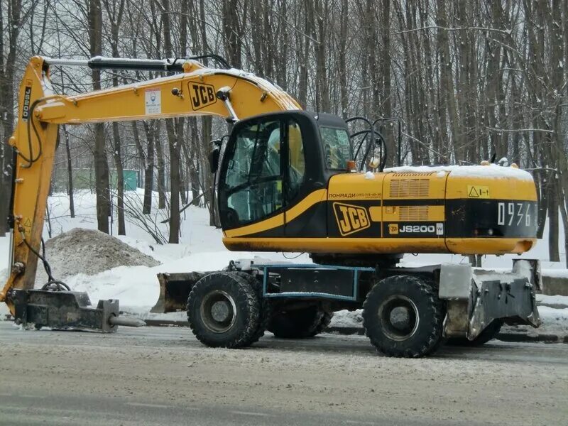 Jcb js200. Экскаватор jcb js200. экскаватор jcb 200 колесный. экскаватор полноповоротный jcb js200w. колесный экскаватор jcb 200w.