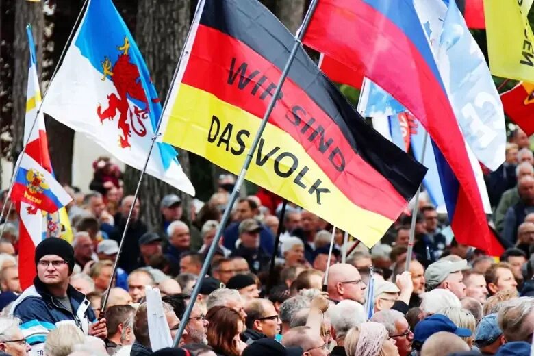 Люди из Германии. Протесты в Германии. Митинги в России. Германия против Украины. Санкции против германии