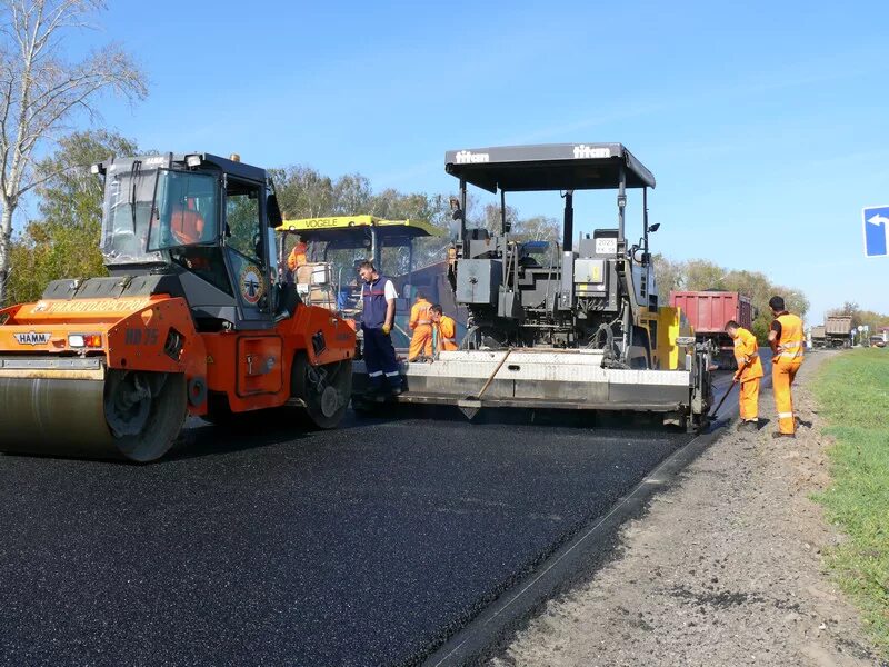 крупная дорожная строительная компания. никоненко дмитрий николаевич донаэродорстрой. монолитный мост. асфальтирование дорог в новосибирске и территорий новосибирск. дорожное строительство фирмы.