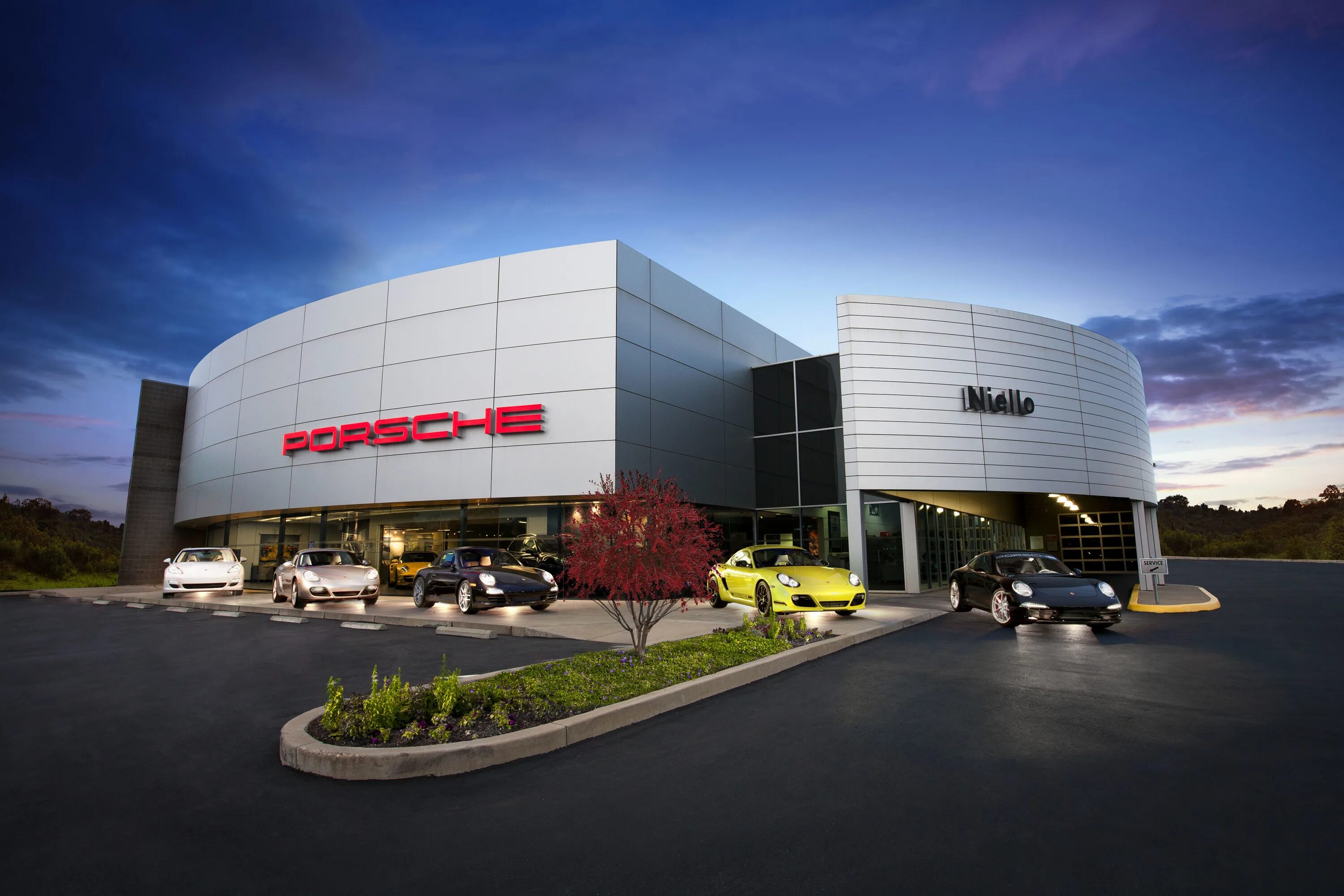 Car dealership. Porsche California building. Dealerships. Dealership in America. Porsche of us auto University.