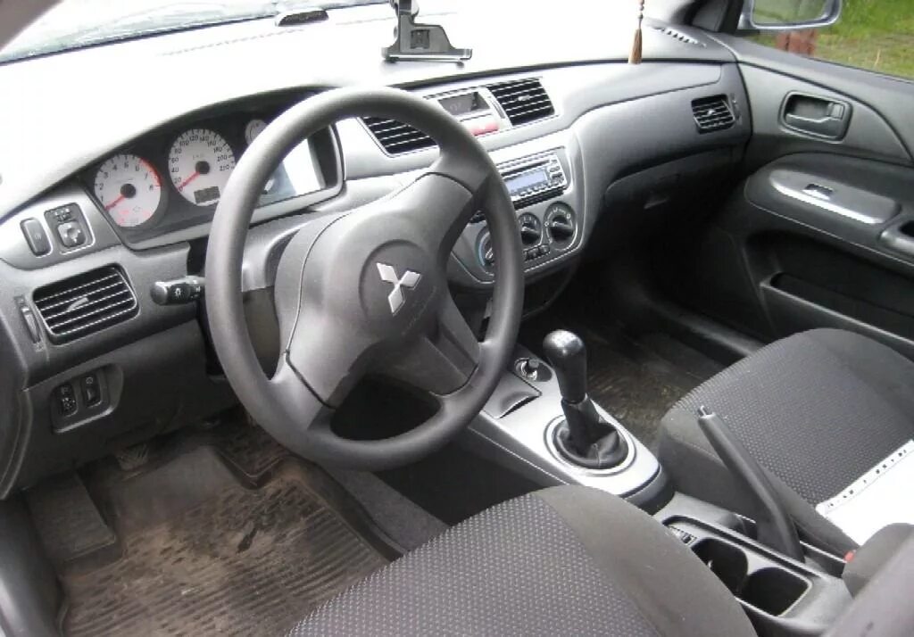 Lancer 9 2007 салон. Митсубиси Лансер 2007 салон. Mitsubishi Lancer 1.6 МТ, 2006,. Митсубиси Лансер 9 Рестайлинг салон. Купить лансер 9 механика