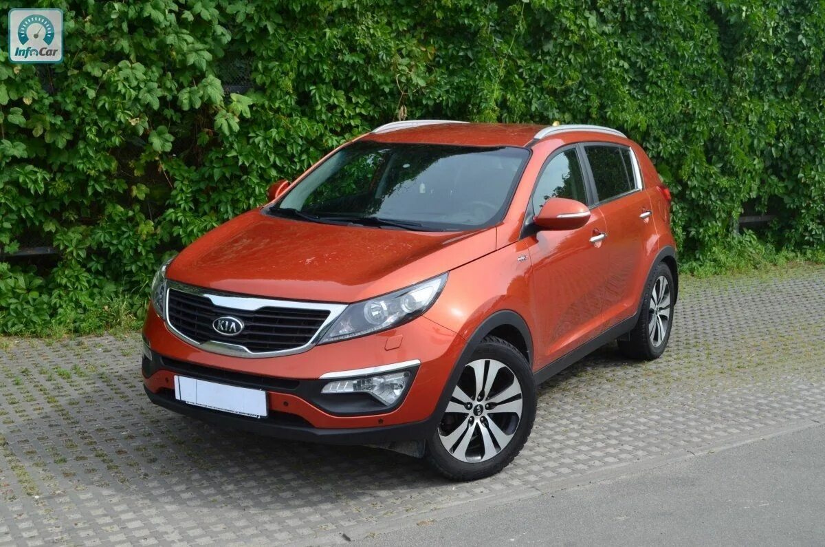 Kia Sportage оранжевая 2012. Киа Спортейдж 2022 оранжевый. Киа Спортейдж оранжевый цвет. Митсубиси Спортейдж 2012 год.