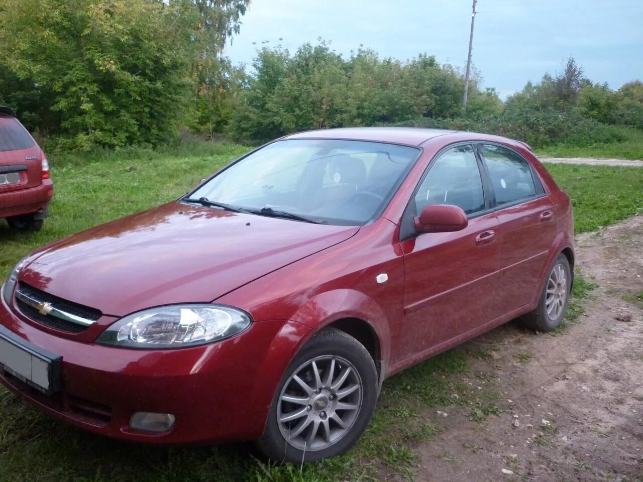 Авито шевроле лачетти хэтчбек. Chevrolet Lacetti 2008 красная хэтчбек. Chevrolet Lacetti 2007 хэтчбек. Шевроле Лачетти хэтчбек красная. Шевроле Лачетти хетчбек 2007г.красный..