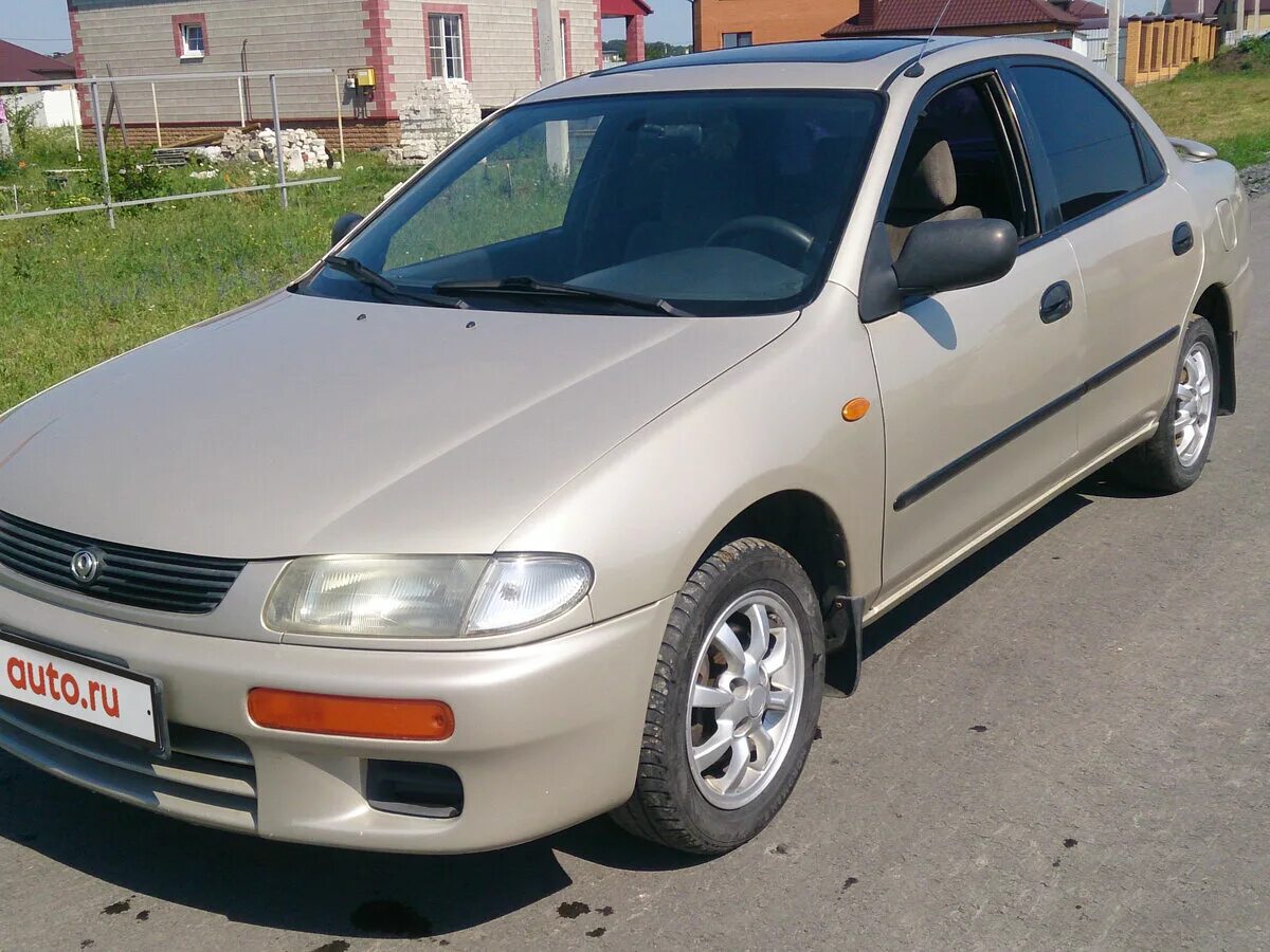 Мазда 323 седан 1995 года. Мазда 323 седан 1995 серый. Mazda 323 95 год. Мазда 323 серая.