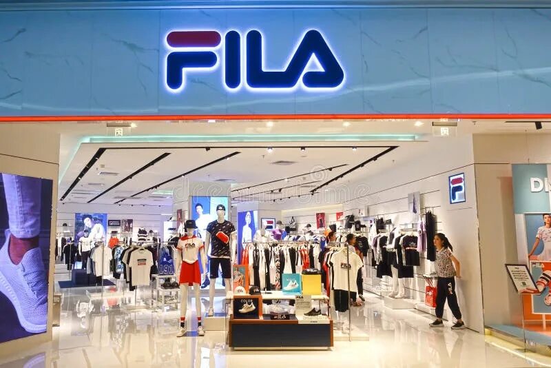 7 фила. Магазин фила. Магазин fila в москве. Fila brand. Шоурум fila.