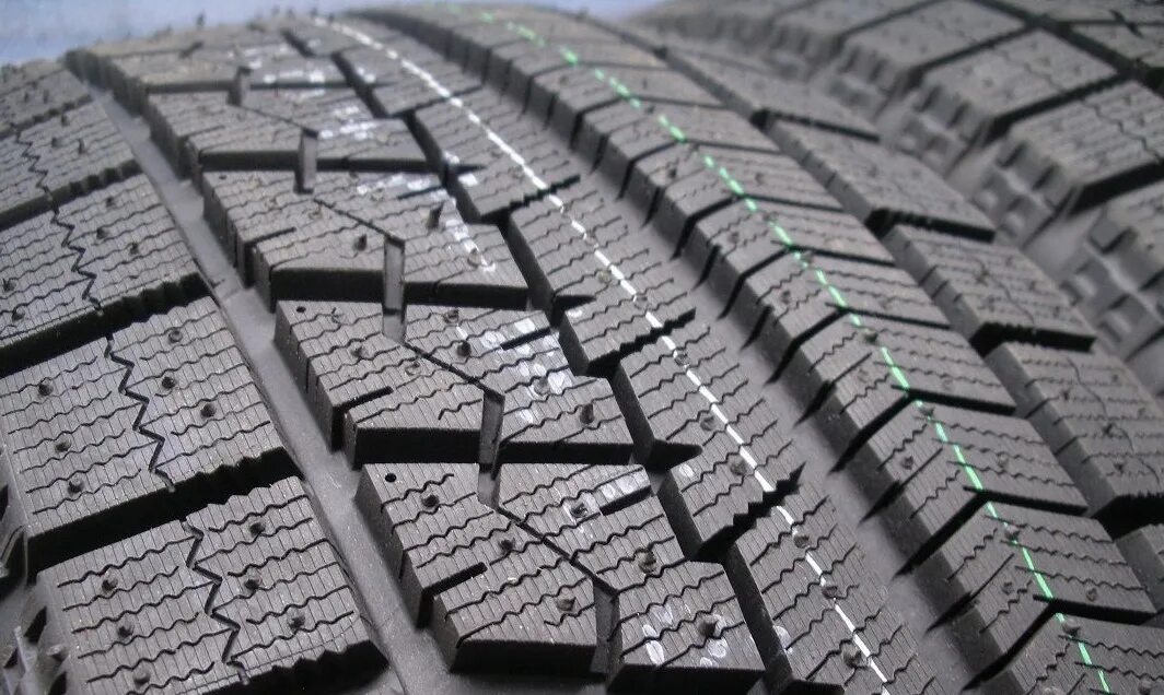 Купить резину бриджстоун 15. Bridgestone Blizzak VRX. Bridgestone Blizzak VRX 185/65 r15. Bridgestone Blizzak VRX 91s. Bridgestone 185/65r15 88s Blizzak VRX.