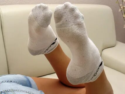 Having feet dirty white ankle socks.