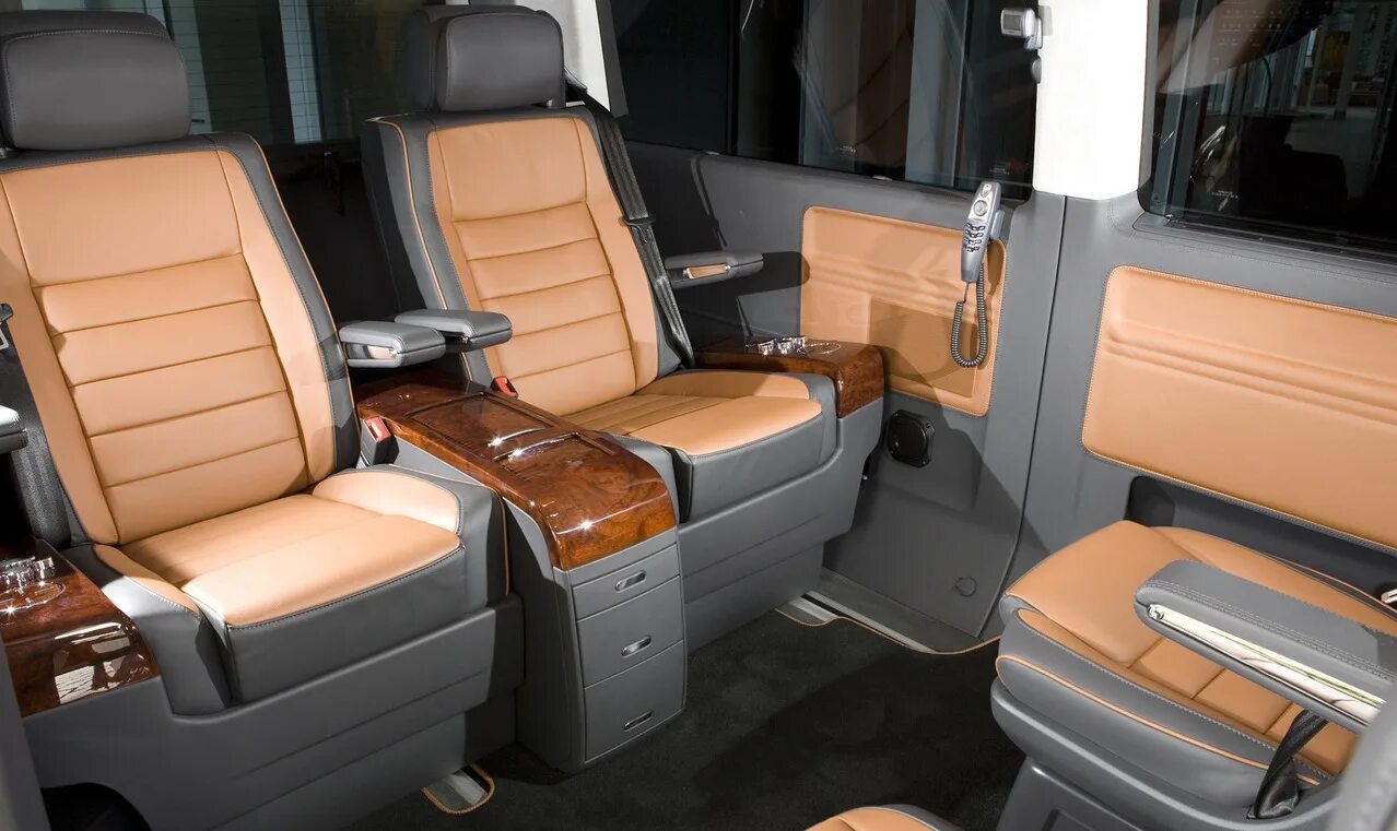Фв мультивен. Vw multivan t5 interior. volkswagen мультивен салон. фольксваген мультивен т5 салон. volkswagen multivan t5 кресла.
