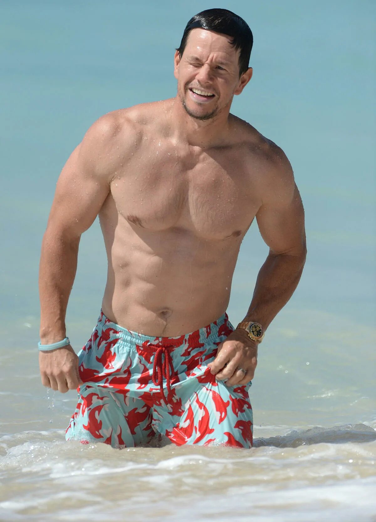 Mark Wahlberg displays his six pack and chiseled chest in Barbados Shirtless act