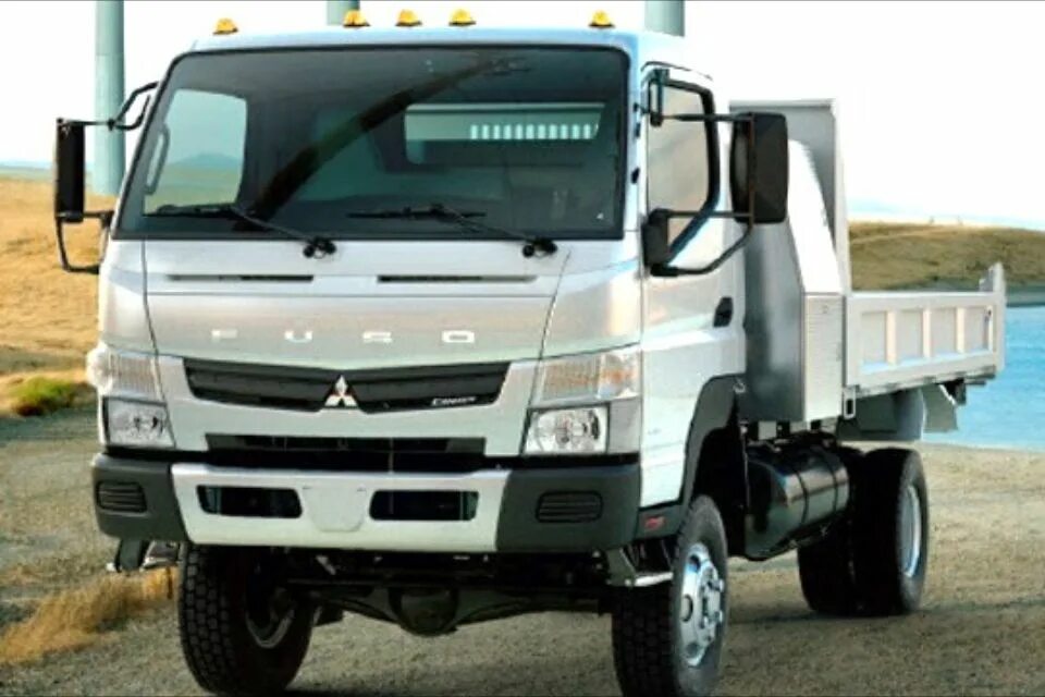 Японский грузовик 4вд. Mitsubishi canter 4wd. Mitsubishi fuso canter 4х4. Suzuki carry 4x4 mini truck. Mitsubishi canter 4wd.