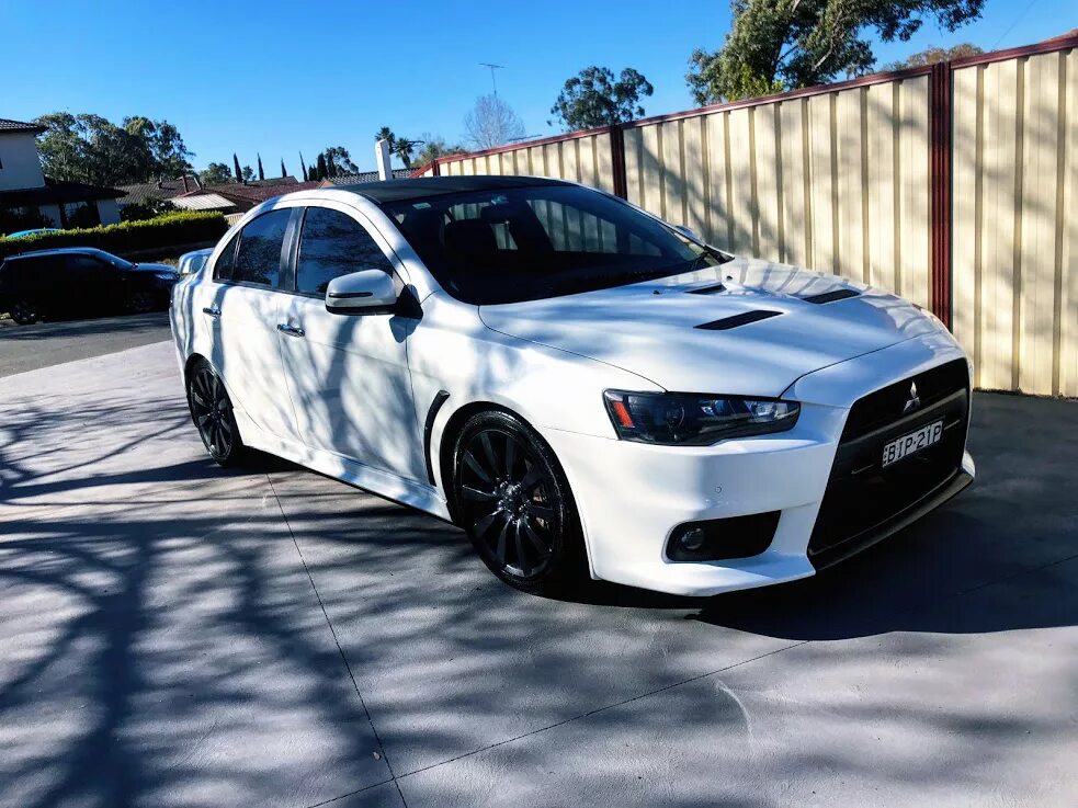 Lancer 10. Митсубиси лансер 10 синий тюнинг. Лансер 10 есть масло. Mitsubishi lancer 2008 2. Lancer 8 ralliart.