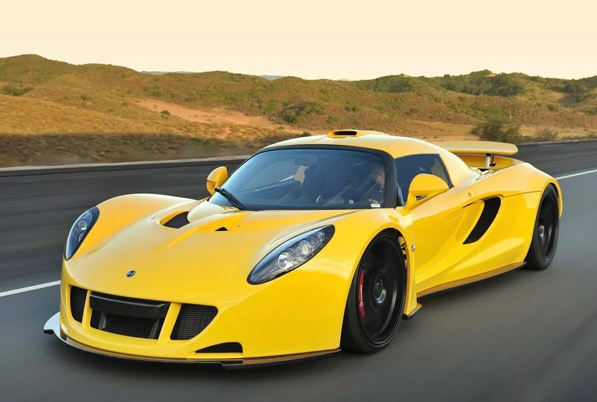 Быстрые серийные машины. Hennessey Venom gt 2010. Hennessey Venom gt 2016. Hennessey Venom gt. Машина Hennessey Venom gt.