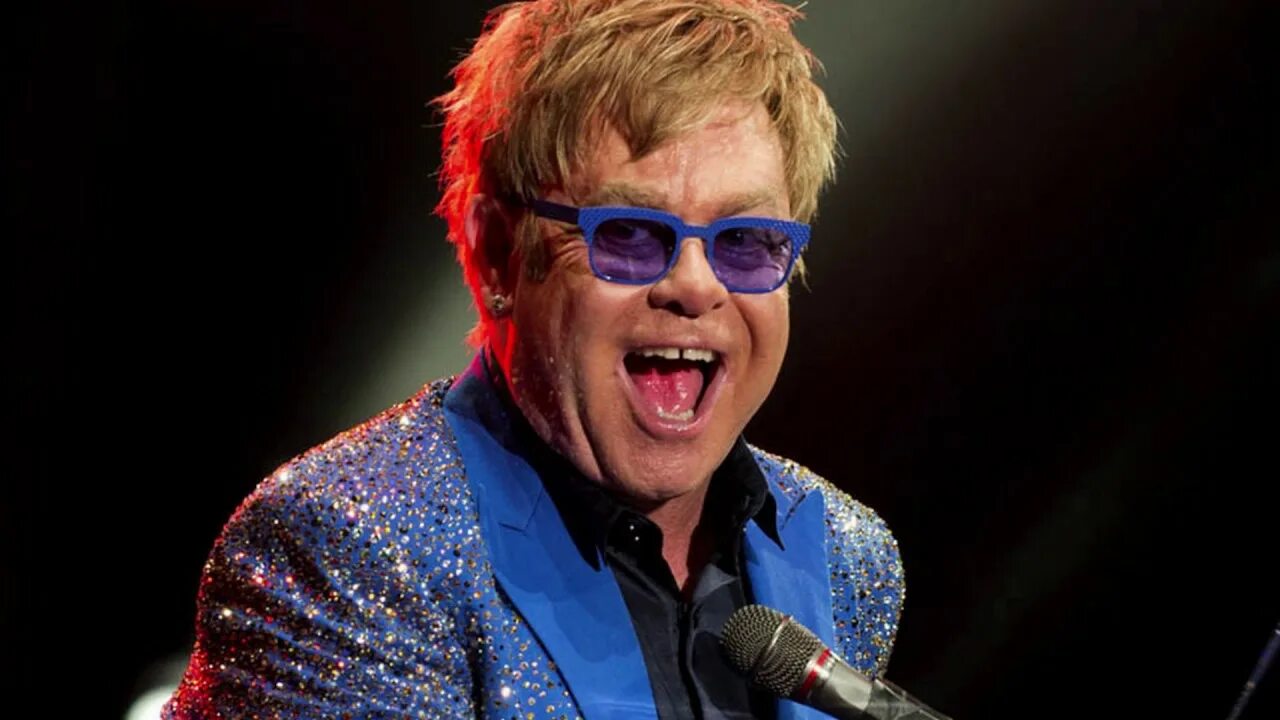Elton john rock. Элтон Джон. Элтон Джон 2022. Элтон Джон зубы. Элтон Джон фото.