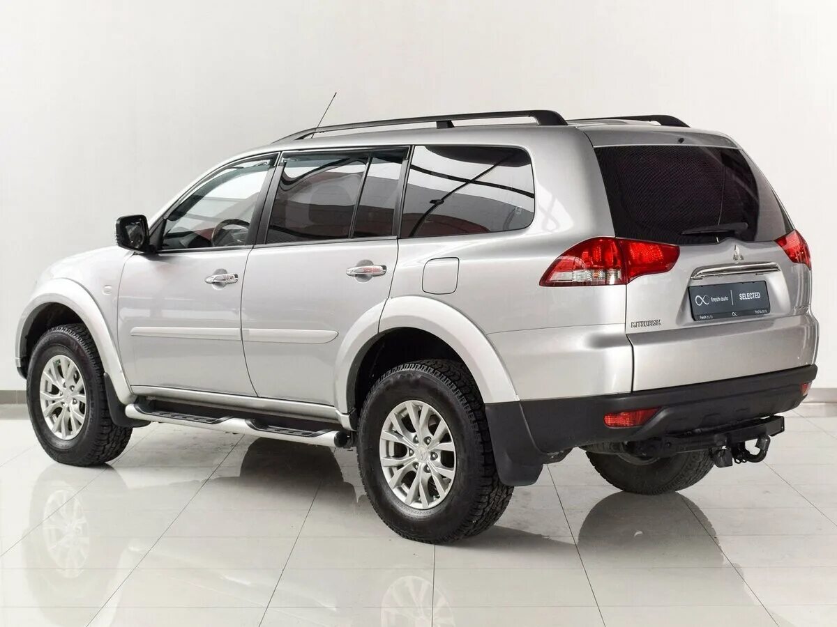 Pajero sport цена. Mitsubishi Pajero Sport 2014. Mitsubishi Pajero Sport 2 2014. Мицубиси Pajero Sport 2014. Митсубиси Паджеро спорт 2014г.