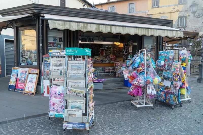 Newsagents перевод. Newsagent`s shop. Newsagent's картинка. Newsagent's перевод. Newsagent's in England.