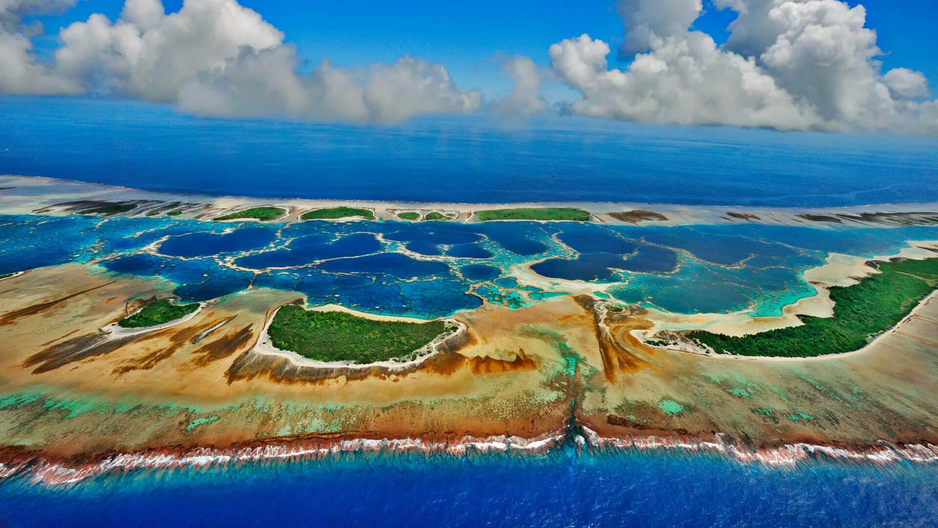 Атолл в тихом океане. Атолл Кирибати. Остров Каролайн, Кирибати. Тарава Кирибати. Каролайн Атолл.
