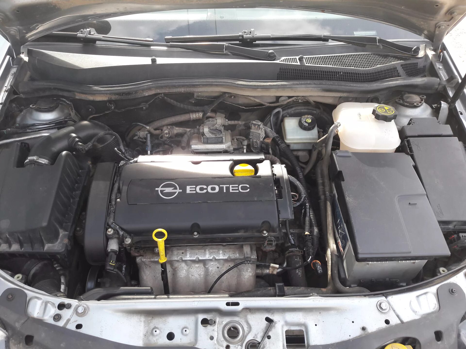Антифриз z18xer. Opel astra h 1.8 антифриз. значок антифриза под капотом. opel astra j gtc антифриз на кпп.