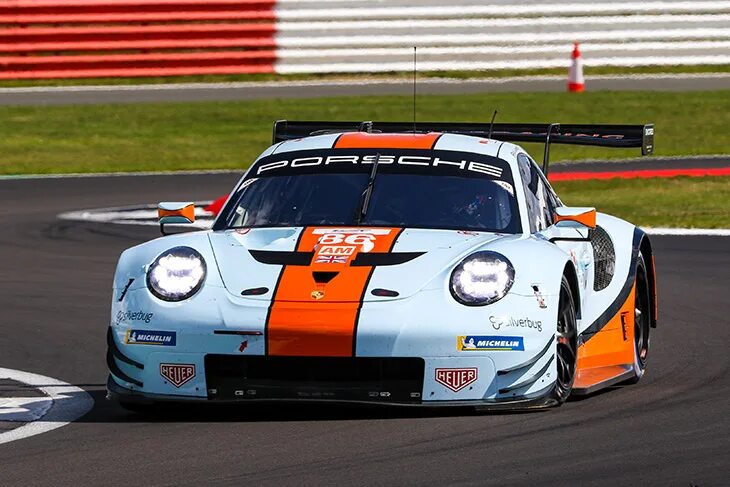 Racing uk. Porsche Gulf Racing. Гулф рейсинг Порше Леман. Порше 911 992 Gulf livery. Porsche 911 Gulf Racing верх.