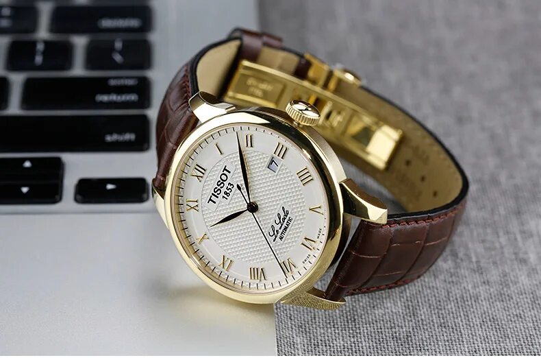 22. Tissot bridgeport automatic. Tissot t41. Наручные часы tissot t035. Часы тиссот 1853 мужские с автоподзаводом.