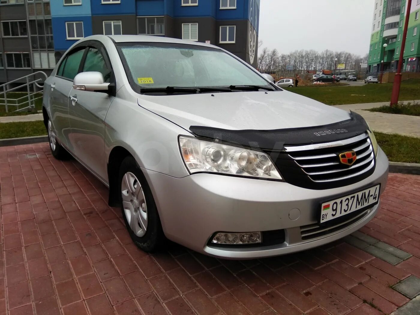 Капот geely emgrand. Дефлектор капота Geely Emgrand ec7. Geely Emgrand ec7 494. Geely ec7 2015. Geely Emgrand 7 2015.