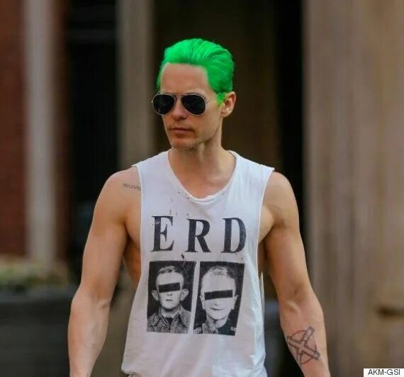 "A guy with green hair and green ." - image created in Shedevrum