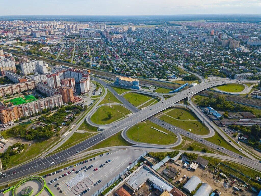 Развязка Мориса Тореза Тюмень. Тюмень дом обороны улица Мельникайте. Тюмень с высоты. Столица Тюменской области. Организации г тюмени