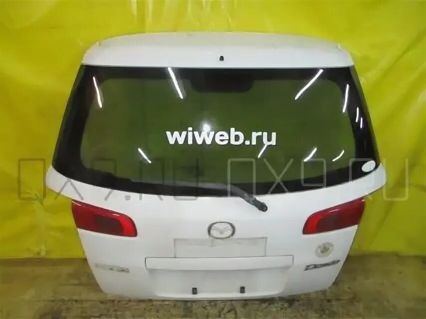 Дверь задняя левая mazda demio dw3w. Обшивка двери мазда демио dw3w. Задняя дверь мазда демио. Мазда демио крышка багажника dw3w. Крышка багажника мазда демио 2004 год.