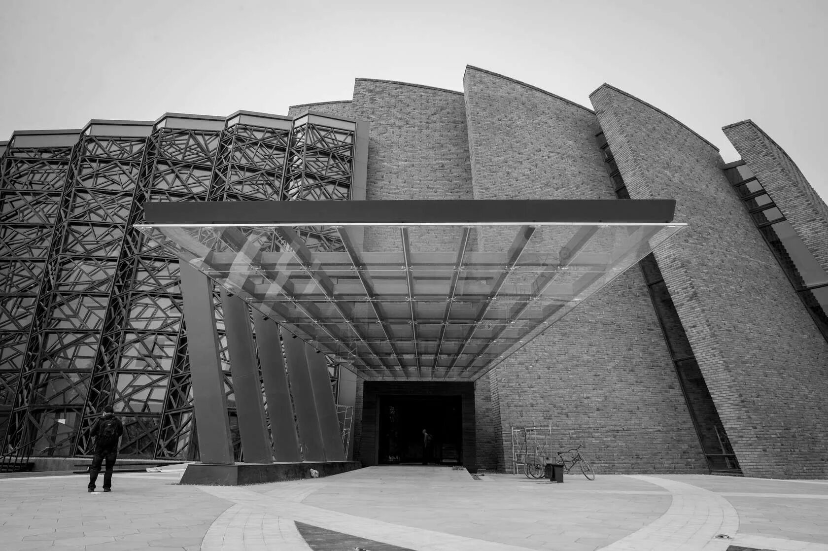 Architecture culture. Архдейли архитектура. Wuzhen Theater план. Wuzhen Grand Theatre. Деконструктивизм архитектура концертный зал Дисней.